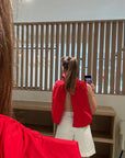 Open back red top